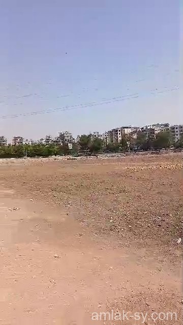 أرض 10 دنم قبل الجسر الاول على طريق المطار للبيع (766)