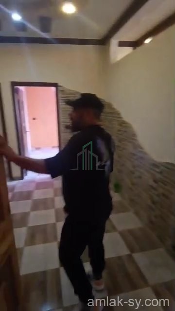 شقة للبيع ببيلا عالشارع العام خلف مشحم النعيم